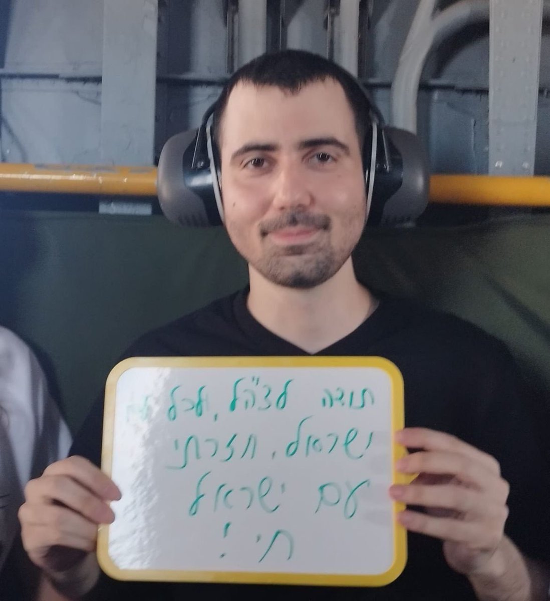 HenMazzig's tweet image. Guy Gilboa-Dalal wrote on his sign in the helicopter: 

“Thank you IDF and the people of Israel. I returned. Am Yisrael Chai”