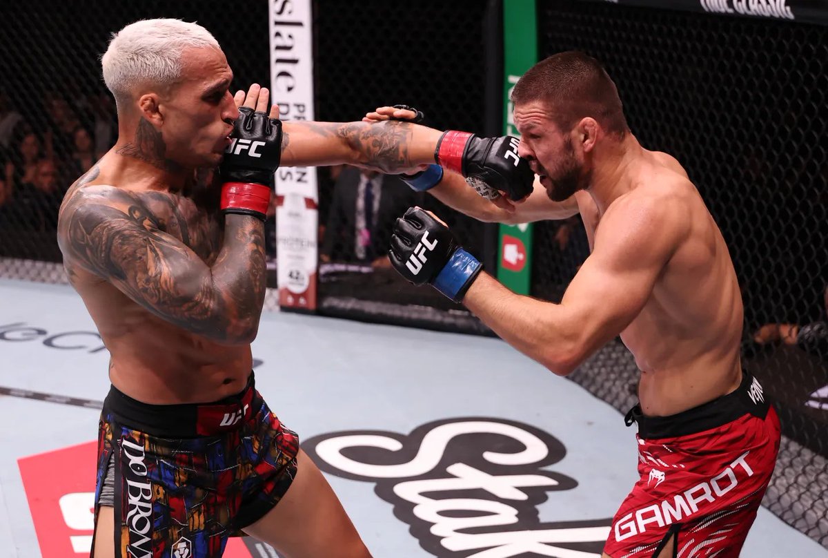 Mateusz Gamrot stepped in on short notice to face Charles Oliveira at UFC Rio but suffered a second-round submission loss—the first finish of his career. Despite the setback, his coach praised his courage and warrior spirit, highlighting his readiness to take big risks. #UFC