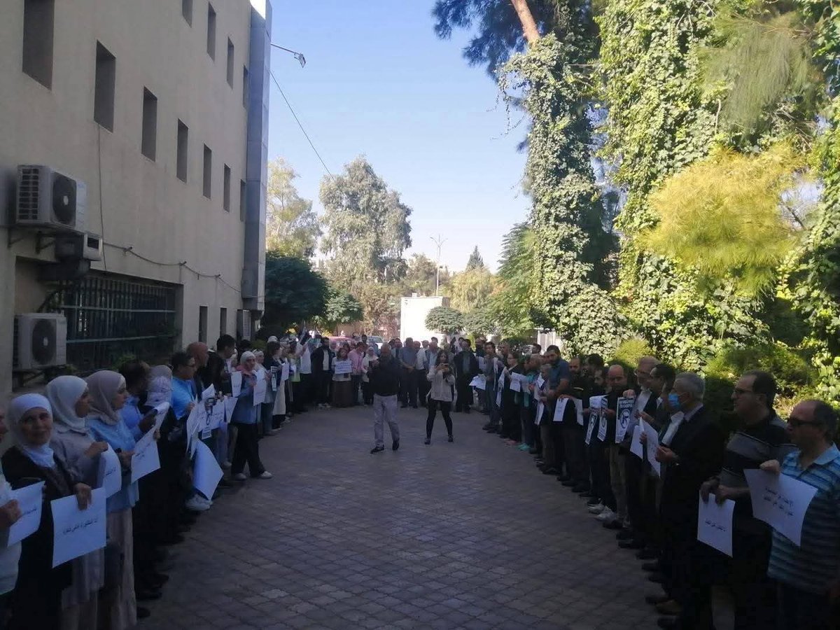 RojavaNetwork's tweet image. A solidarity stand was held at Damascus University following an armed attack on the Dean of the Faculty of Arts under control of HTS terrorists