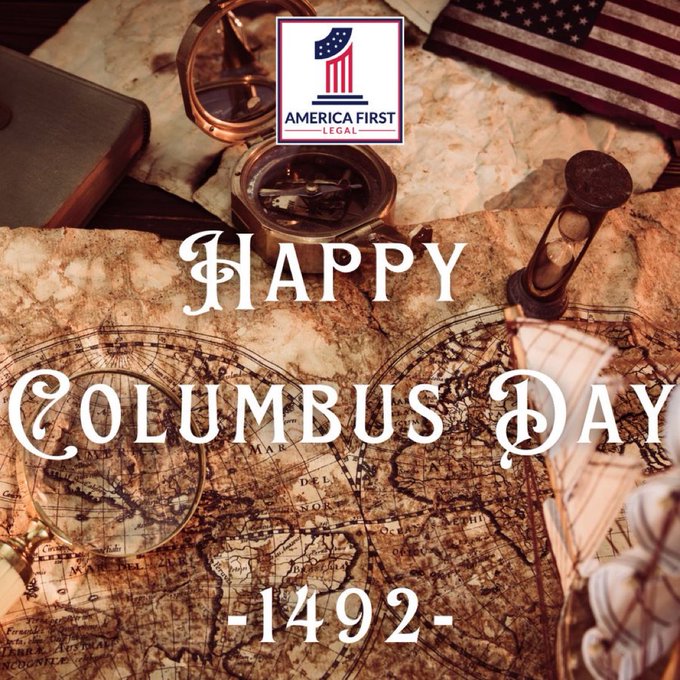 An antique-style parchment map serves as the background with a brass compass placed centrally, an hourglass nearby, and scattered nautical elements like a quill pen. Elegant scripted text reads Happy Columbus Day spanning the top and bottom. The years 1492- appear below in smaller font. An American flag and the America First Legal logo are positioned in the upper left corner.