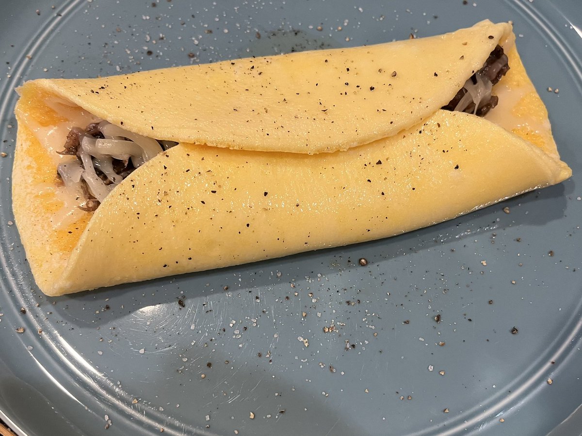 Leftover beef short rib with mozzarella cheese, inside a three egg “tortilla.”