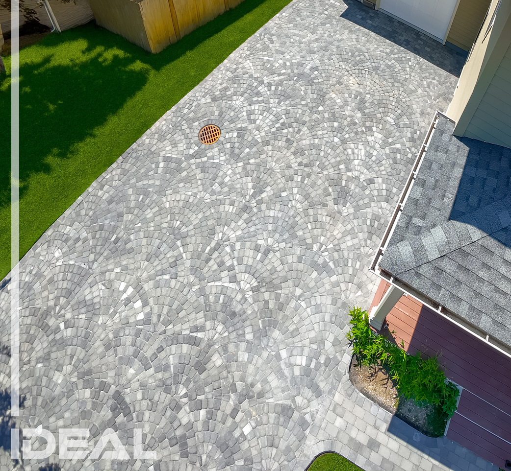 ByPavers's tweet photo. Our Circle Paks are designed for so much more than just perfect rounds. This stunning fan-pattern driveway was created using multiple Circle Paks — showcasing how versatile and eye-catching paver design can be. https://t.co/4ahyhsjEqy