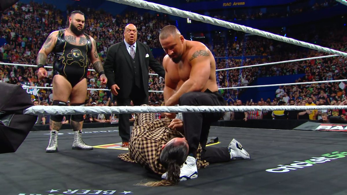SeanRossSapp's tweet image. BRON BREAKKER SPEARED ROLLINS!!!!