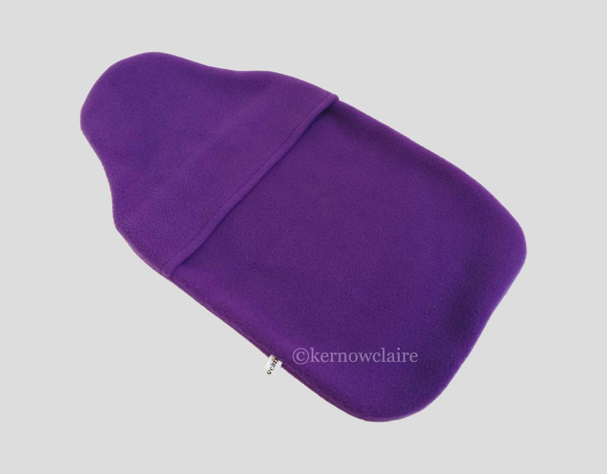 A lovely purple hot water bottle cover in fleece, lovely and warm, fits a 2L standard hot water bottle. #hotwaterbottlecover #purple #fleececover #handmadeintheuk #kernowclaire #newonfolksy #etsyshop #folksyshop #madeincornwall folksy.com/items/8139092-…