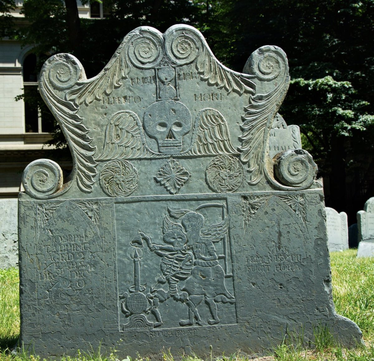 Day 13 of #31DaysOfGraves: Skeleton. Here in New England, skeletons on 17th and 18th century gravestones abound. Going with the celebrated Joseph Tapping stone, d. 1678, in Boston’s King Chapel Burying Ground. Photo not mine, credit unknown.