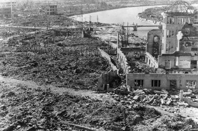 UnkleAyo's tweet image. Both of these pictures are snapshots from Hiroshima, Japan. 

One was taken just after the entire city was levelled by atomic bomb in 1945.

The 2,3,4 were taken 4 months ago, when I visited Japan.

The backwardness of Nigeria is not a bug. It is a feature.