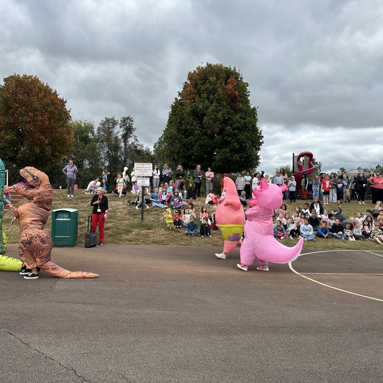 As one of our fun run goals, students were treated to an inflatable race by our very own AGR staff!