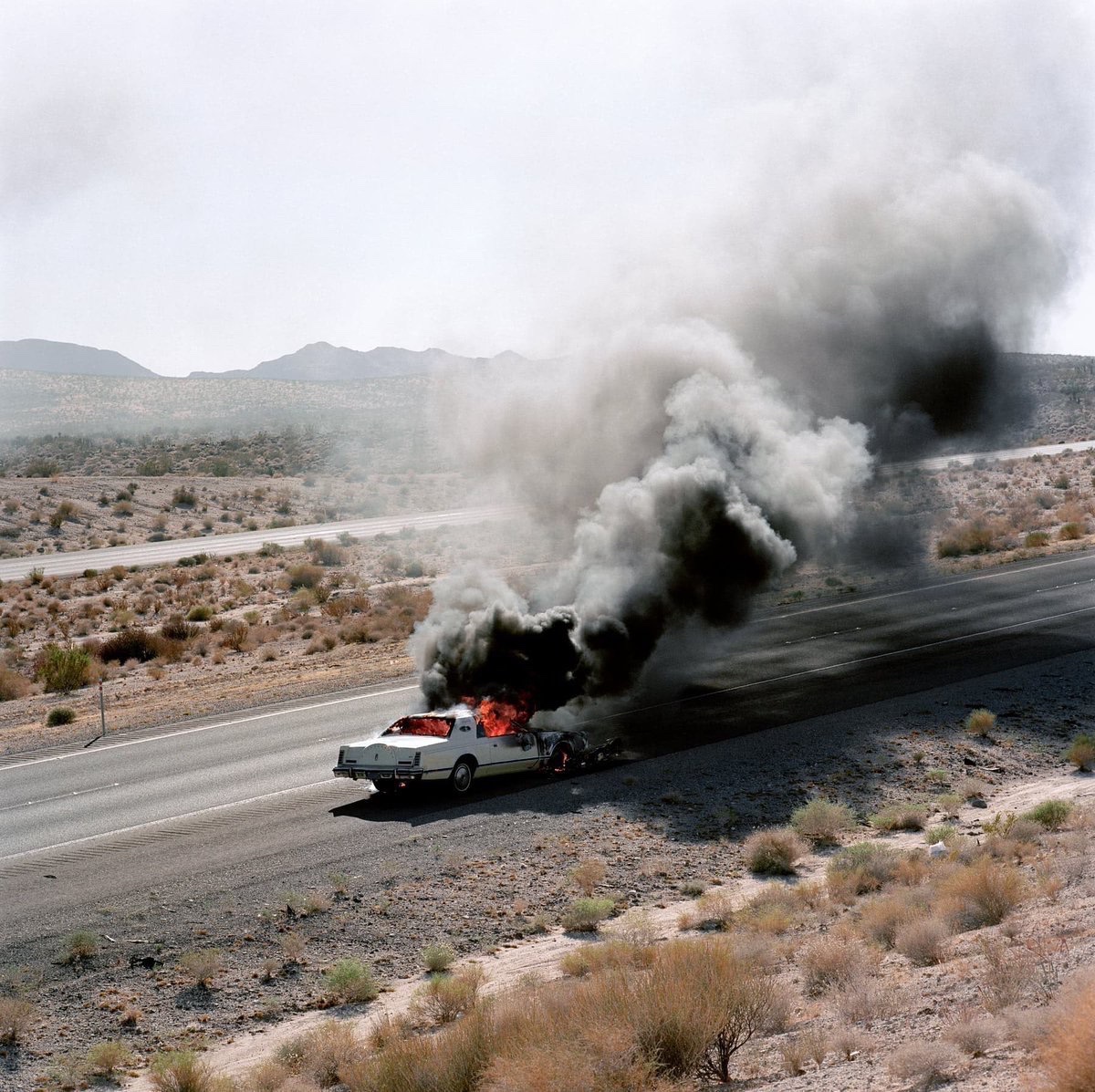 eyeonaxis's tweet photo. 'Highway, approaching nowhere'. USA, 1990s  |  Jeff Brouws https://t.co/JDwVpJ5kwy