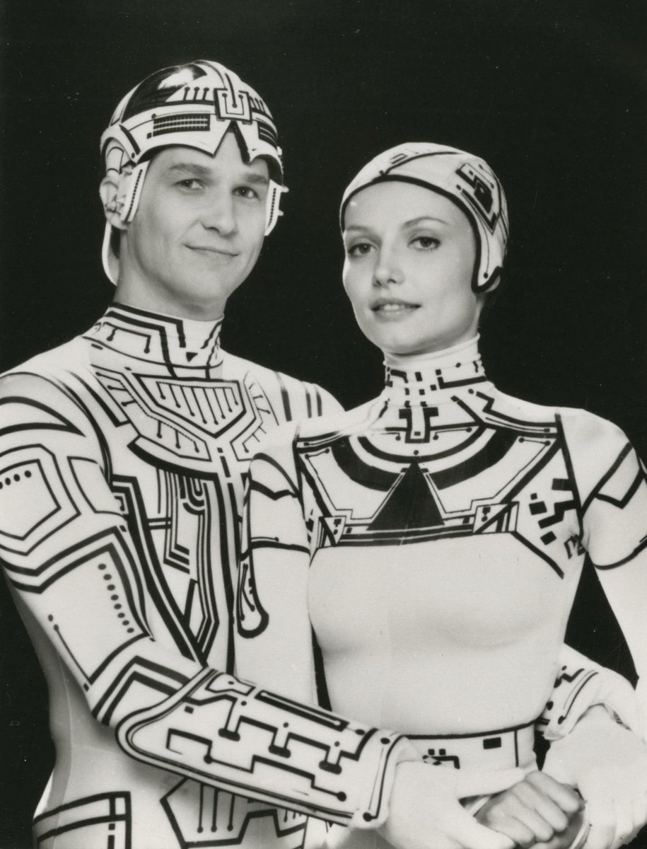 TRON publicity still with Jeff Bridges and Cindy Morgan