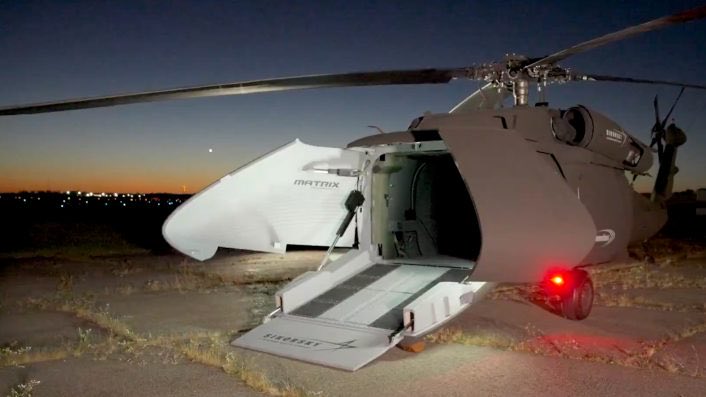 sentdefender's tweet photo. Sikorsky Aircraft, a Lockheed Martin Company, today unveiled their next-generation fully-autonomous multi-mission helicopter at the Association of the United States Army (AUSA) Conference, the S-70UAS U-Hawk, a highly modified version of the UH-60L Black Hawk with no forward cockpit and instead featuring actuated clamshell doors and a forward loading ramp into a flat cargo bay for vehicles, troops, and other equipment, resulting in at least 25% more cargo space than the original UH-60L.