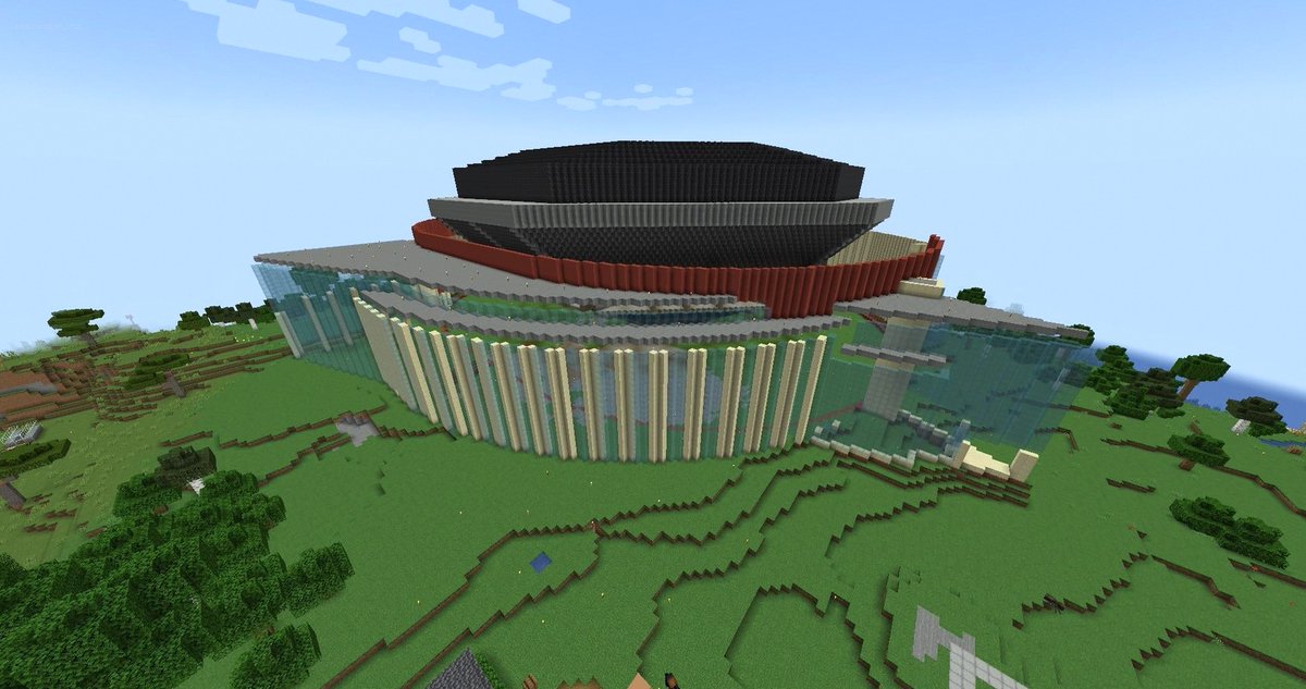 nuggetRush3's tweet image. Big Nuggets fan friend, I’m a Thunder fan. I built Ball Arena in Minecraft survival—hours since May, guided by satellite imagery. Still missing outer wall, roof, concourse. Ideas? Jokic mural underground. 🏟️🧱