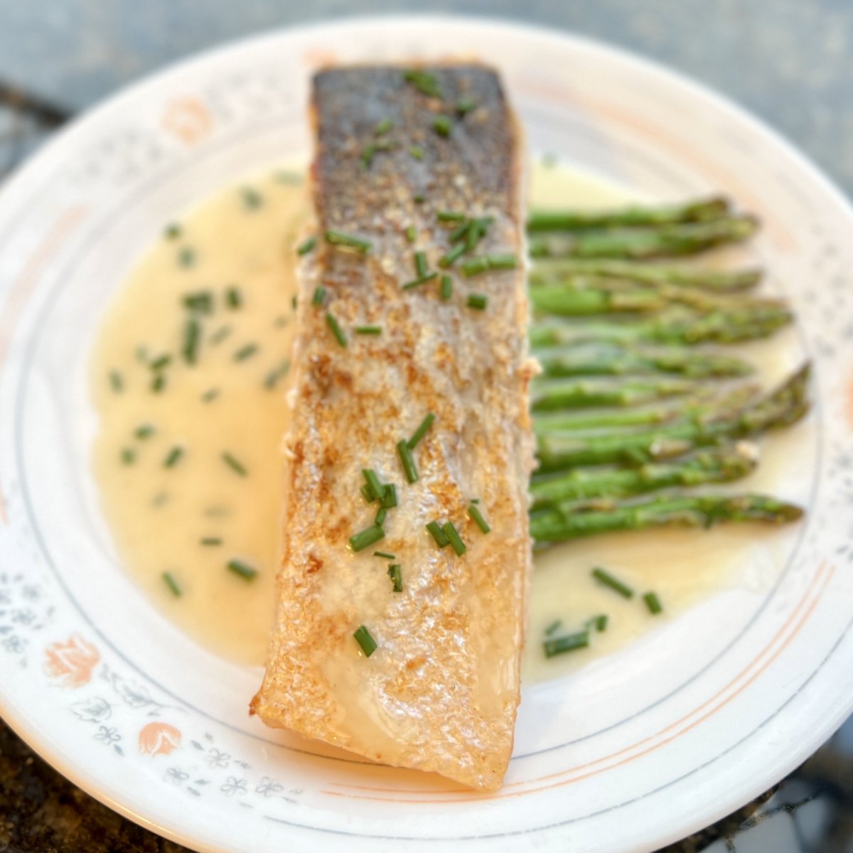 Dinner is served.  Crispy Skin salmon, roasted asparagus, Beurre Blanc