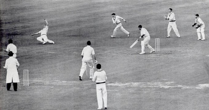 Richie Benaud takes what one newspaper described as "the catch of a lifetime" to dismiss Colin Cowdrey in the 1956 Lord's Test. It was not off an edge, either, but an attacking shot, the force of which knocked Benaud backwards. "Benaud, fielding at short gully eight yards from