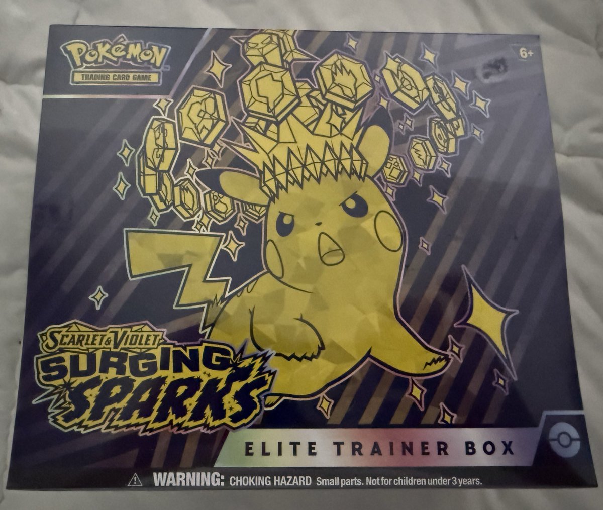 Packing up our first-ever Pokémon giveaway item to send it to its new home. Hoping for some good pulls in this one! Love the art on this ETB.