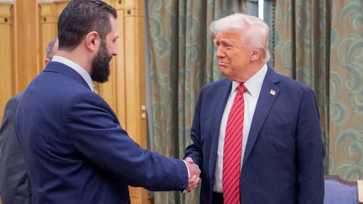 VarunKrRana's tweet photo. This is your president shaking hands with Ahmed Al-Sharaa, focus on being baffled about it for next 72 months. https://t.co/s8BxVkHiju