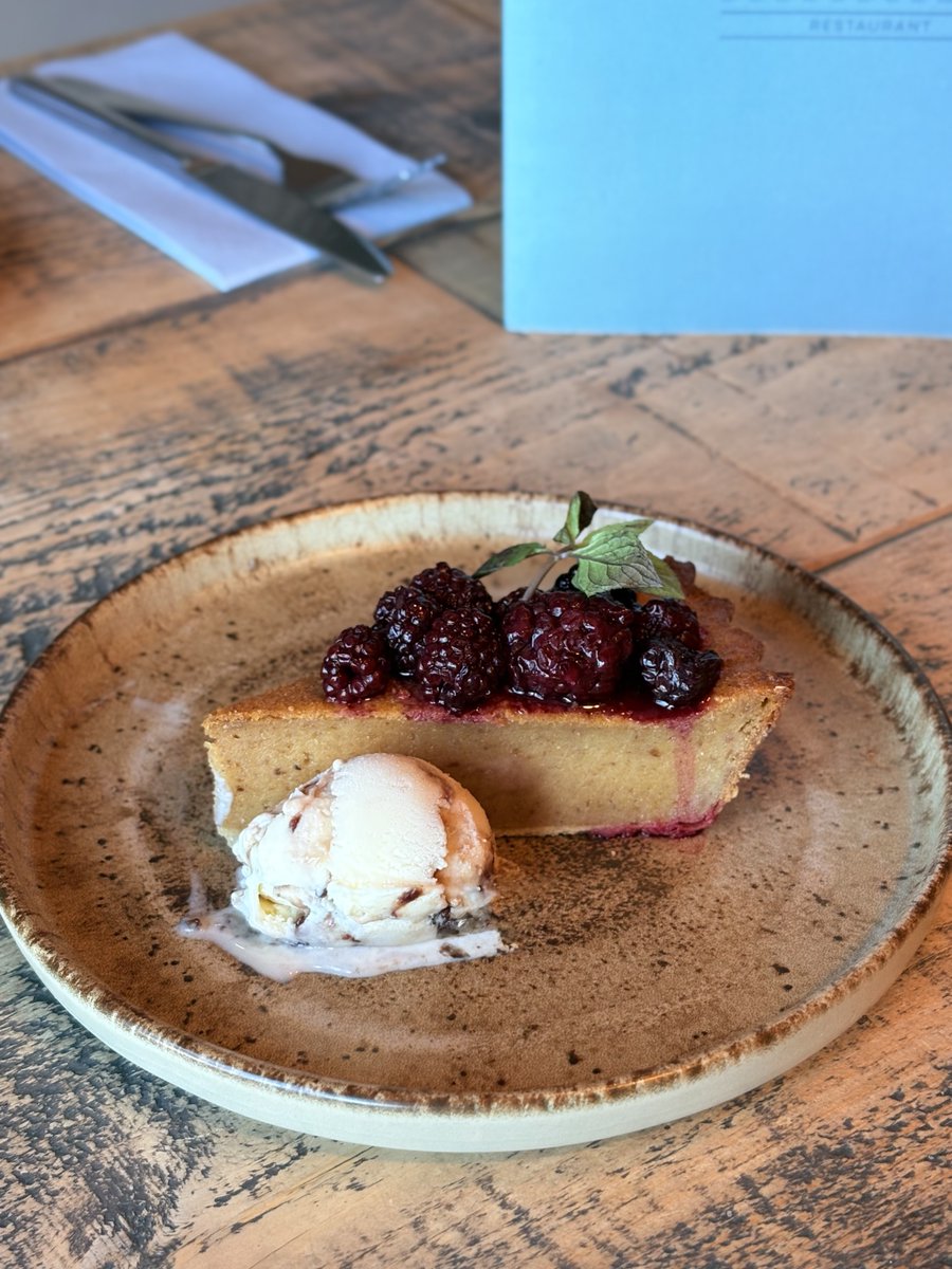 It's National Dessert Day!

Just look at this golden slice of Treacle Tart, served
with luxurious clotted cream and a tangy-sweet
blackberry ripple ice cream. Pure comfort and pure
perfection.

What are you treating yourself to today? 👇

#NationalDessertDay #WhitleyBayEats