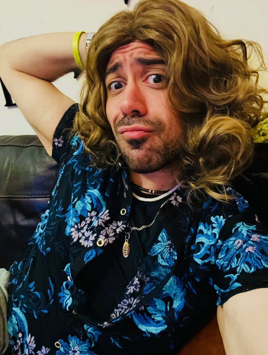 This is me with a wig. 

That is all. Buy books. Be kind to strangers. Have a good day!