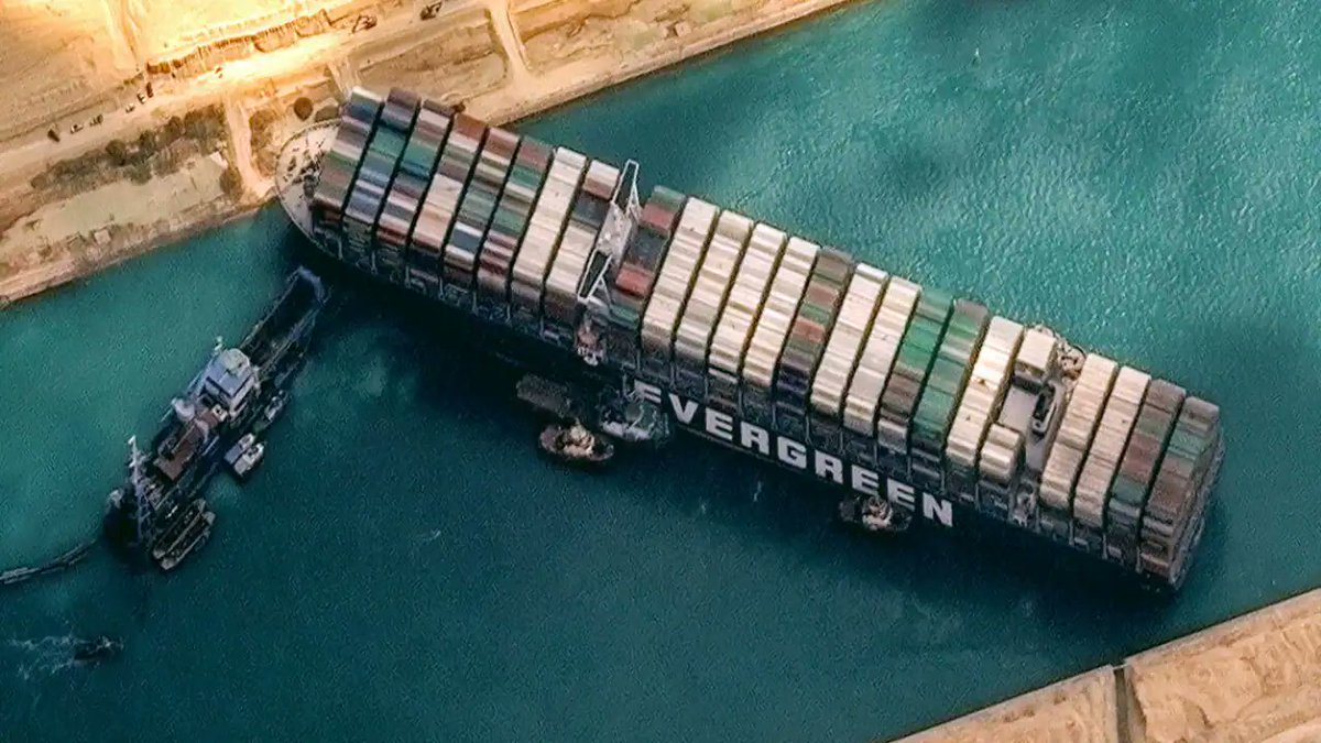 Andr3jH's tweet image. Breaking: massive container ship blocks the Suez canal. ship reportedly lost orientation following the end of win 10 support.