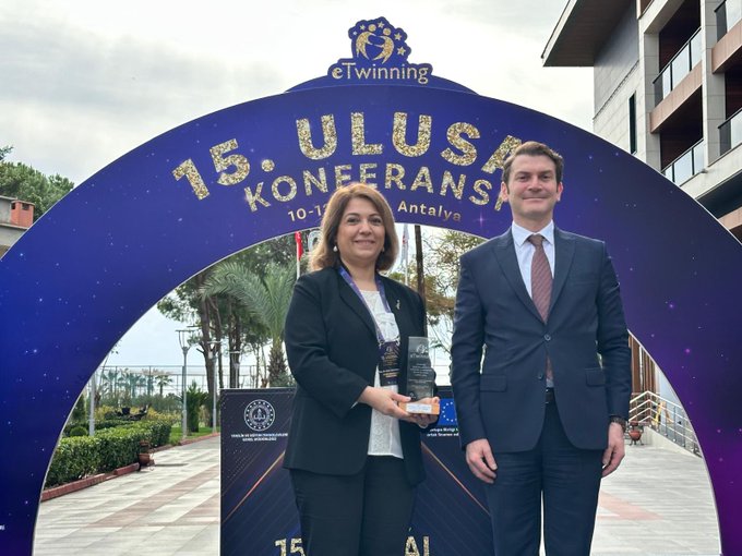 First image displays a blue archway banner reading 15. ULUSAL eTWINNING KONFERANSI 10-12 EKİM ANTALYA with eTwinning logo above, two individuals a woman in a suit holding a trophy and a man in a suit standing beside her, palm trees and greenery in the background, Turkish flag visible. Second image is a collage showing multiple scenes of a conference including groups of people in professional attire at tables with laptops and microphones, women presenting or receiving awards with sashes, projection screens with text, banners with eTwinning logos, and attendees in discussion. Third image features a conference room with a large screen displaying Impact on Service Teachers pie chart in yellow green and blue sections, a woman speaker in a light outfit at a podium gesturing, a man seated nearby, European Union flag banner on the wall, chairs and tables arranged.