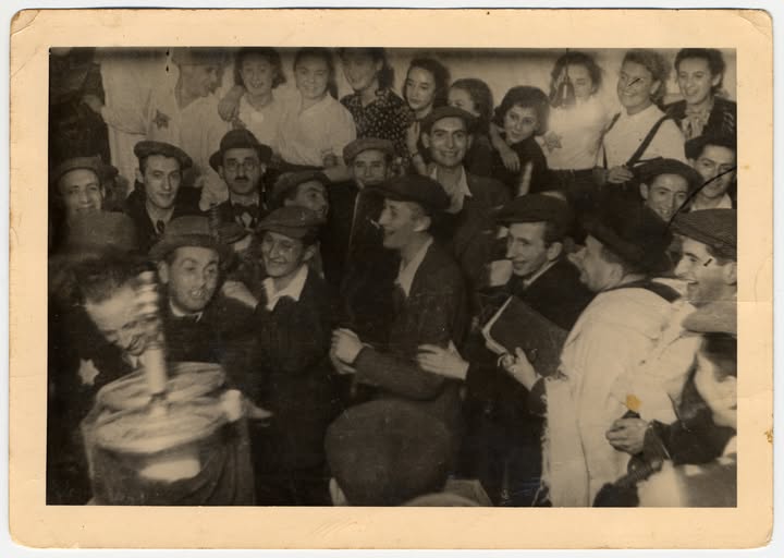 Simchat Torah
On Simchat Torah – the Jewish holiday marking the conclusion of the annual cycle of Torah readings, and the start of a new cycle – WJRO wishes Chag Sameach – to everyone celebrating this joyous holiday.
Members of Hanoar Hatzioni, a Zionist youth movement, dance