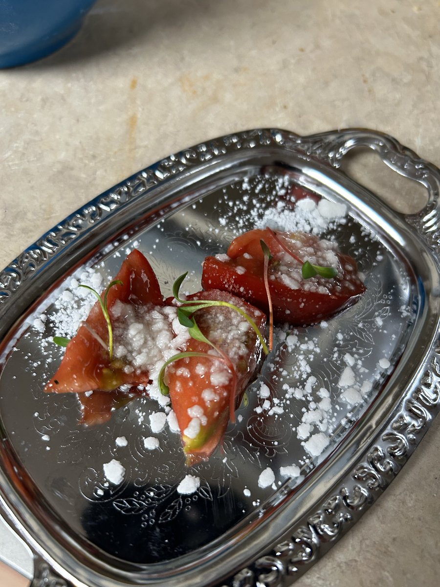 Heirloom tomatoes with microgreens and “agave jalapeno salt”.