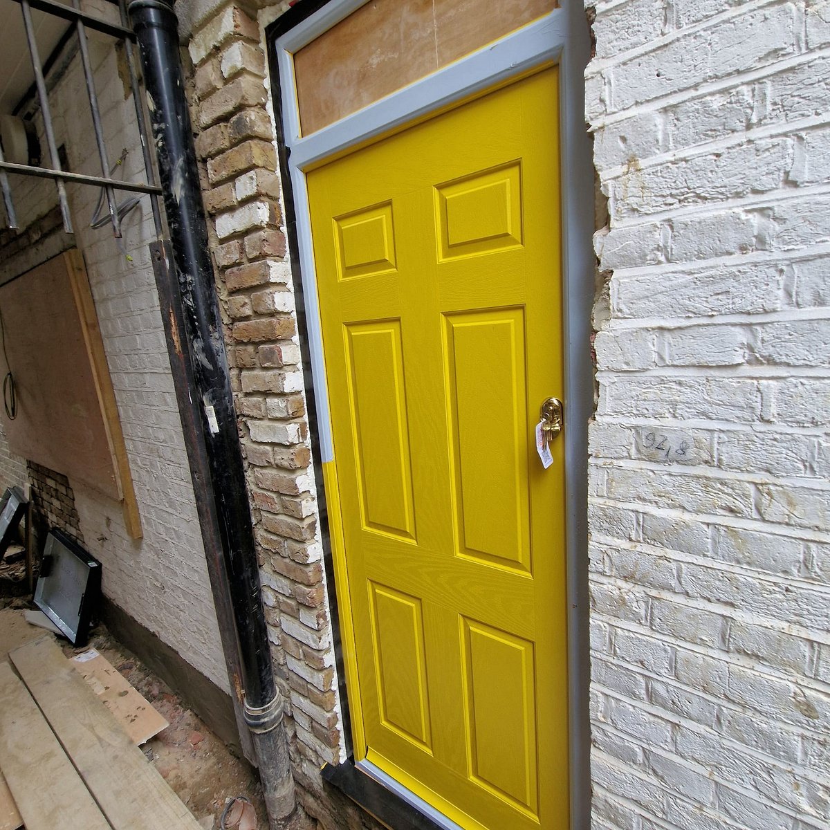 It's a full on #refurb for this Kilburn property - aluminium #Frenchdoors and single doors and a real pop of colour with this #brightyellow composite door💛 We'll be returning soon for further installments! #watchthisspace #aluminiumdoors #Compositedoors #EnergyEfficient