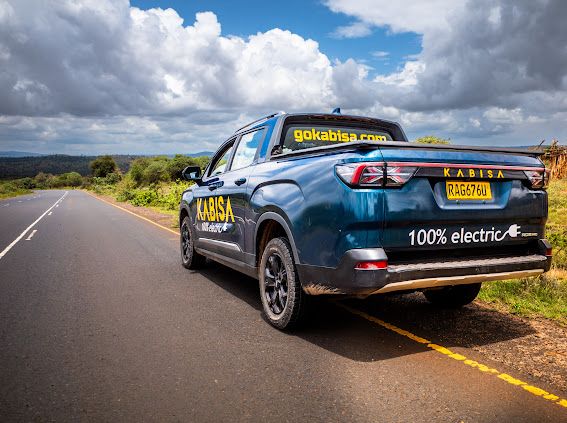 KenyaPower's tweet photo. The Kabisa Workhorses.
 
Part of the #RoadtoAddis convoy has been an e-pickup and an e-truck from @KabisaElectric,  two machines that have carried their weight and then some.
 
The e-pickup has led the charge from the front, mainly handling logistics. It’s the Geely Radar RD6; a refined drive with excellent power delivery and surprising comfort off-road. It has a 65 kWh battery, delivering roughly 320 km on a full charge.
 
The truck has brought up the rear, carrying, for example, extra batteries for the two e-motorcycles. It’s the GeelyH9E Light Truck, a 5-tonne refrigerated vehicle with a 132 kWh battery that delivers about 320 km on a full charge. Practical and steady over long distances, it’s well suited for transport and logistics, especially for moving perishables.
 
The truck is driven by Christian Byiringiro, who is a driver at Kabisa, and based in Rwanda. He says e-mobility has gained much traction in the country over the last few years. 
 
Christian drove the pickup from Kigali, Rwanda, leaving on Sunday, 28 September, and arriving in Nairobi on Wednesday, 1 October. This was his second drive from Kigali to Nairobi, the first being during Kabisa’s participation in Kenya Power’s 3rd E-Mobility Stakeholders Conference and Expo, held in May 2025 at the Kenyatta International Convention Centre.
 
He notes that drive was smooth thanks to the wider network of chargers in Rwanda and Uganda. He describes the Road to Addis as incredible and appreciates Kenya Power’s support in charging the e-convoy on the Kenyan side.
 
With him in the e-truck is Peter Kariuki, Charging Operations Assistant, Kabisa.
He calls the trip fantastic, insightful, and worth every kilometre. Through the Road to Addis, he’s seen how different utilities are working together to make e-mobility seamless with the necessary power access, grid stability, and the technical skill to back it all.
 
Kabisa, established in 2020, operates across East Africa and is developing an EV Highway linking Rwanda, Uganda, and Kenya to make cross-border electric transit easier. It has a wide range of products suitable for the Eastern African e-mobility market including trucks, pickups, SUVs, minibus, minivans, and prime movers. It offers complimentary services, both in-house and on the road, to all of its customers. 
 
For Kabisa, this journey is not just about reaching Addis. It’s about proving that an electric future for East Africa is already within reach.
#eMobility #PoweringEMobilityKE #TheFutureIsElectric #PoweringKenya #AEW2025 ^ZM