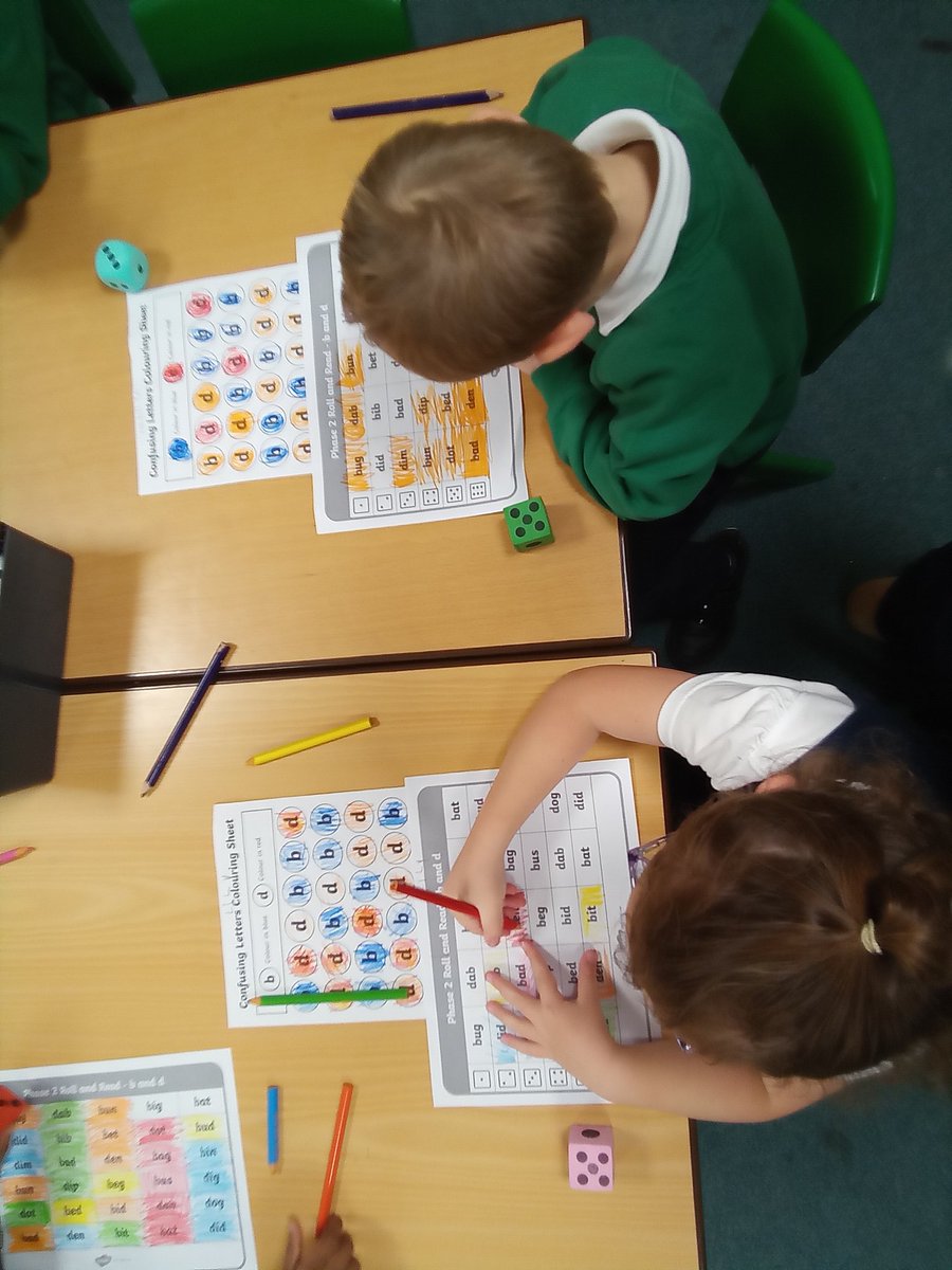 Year 1 reinforcing their recognition of b and d in a game.