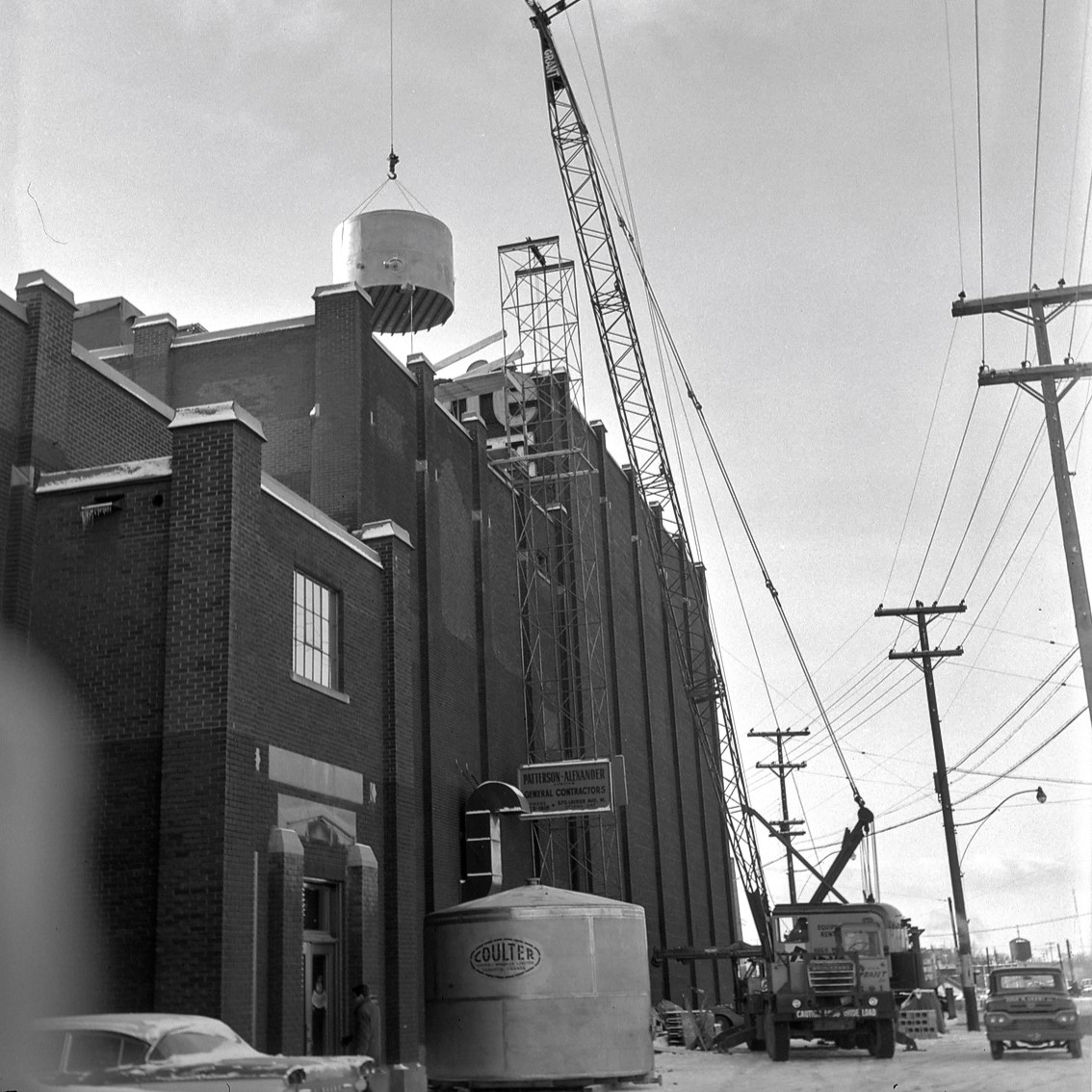 2 new pics added to my recent Brading's Brewery story...
1) A giant crane lifts one of two 7000 gallon wort tanks to top of O'Keefe's Ottawa brewery (prev. Brading's-Capital, present-day SW corner of Albert &amp; Preston) as part of a three-year, $1 million expansion program (1962).