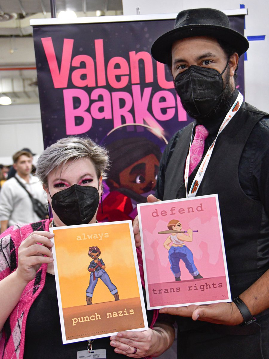 “I wear a mask to protect the more vulnerable people in the society.”Behind the KN95 respirators are Illustrator Valentine Barkers and his wife Diane who modeled for Valentine’s social justice art collection. <a href="/MsJulieSLam/">Julie S. Lam</a> #MaskTogetherAmerica founder met them at the #NYCC25 💖 😷