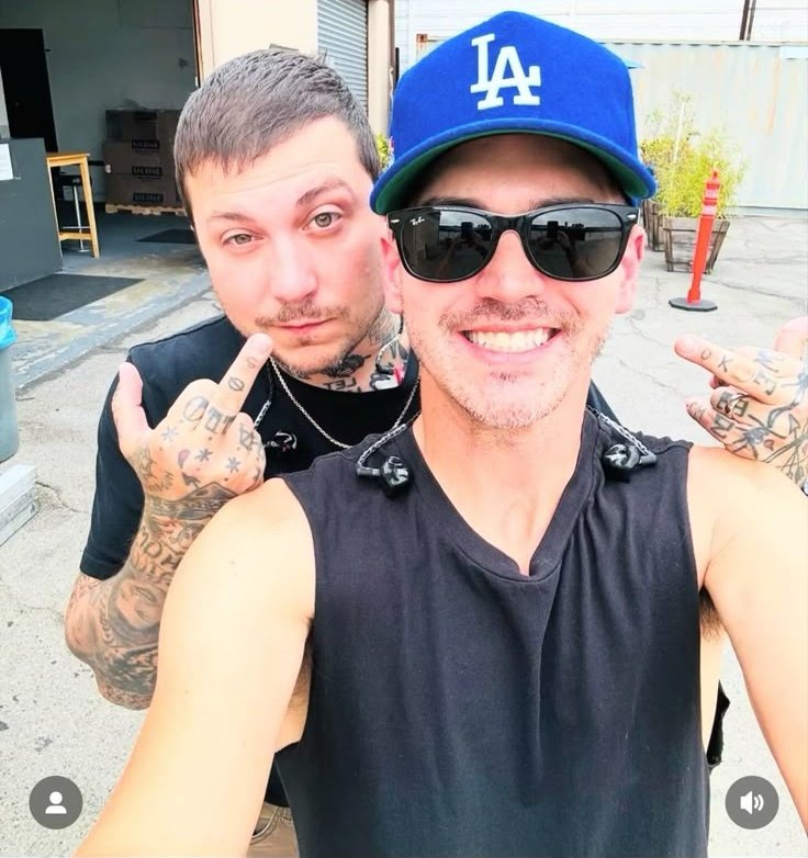 Why is the dog behind the pretty butch lesbian flipping me off??