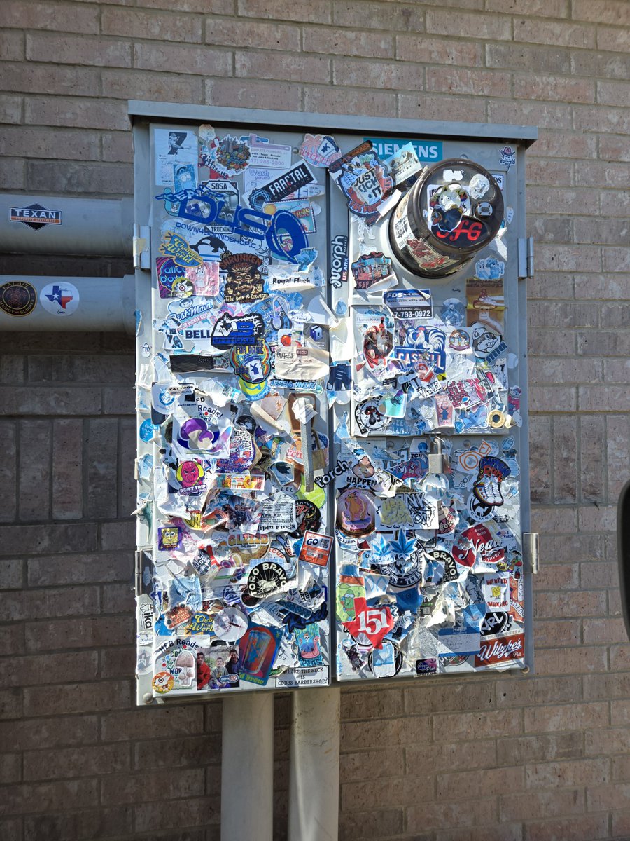 gootergooter's tweet image. shoutout to this electrical box at the drive thru at my braums thats been collecting stickers for 2 years