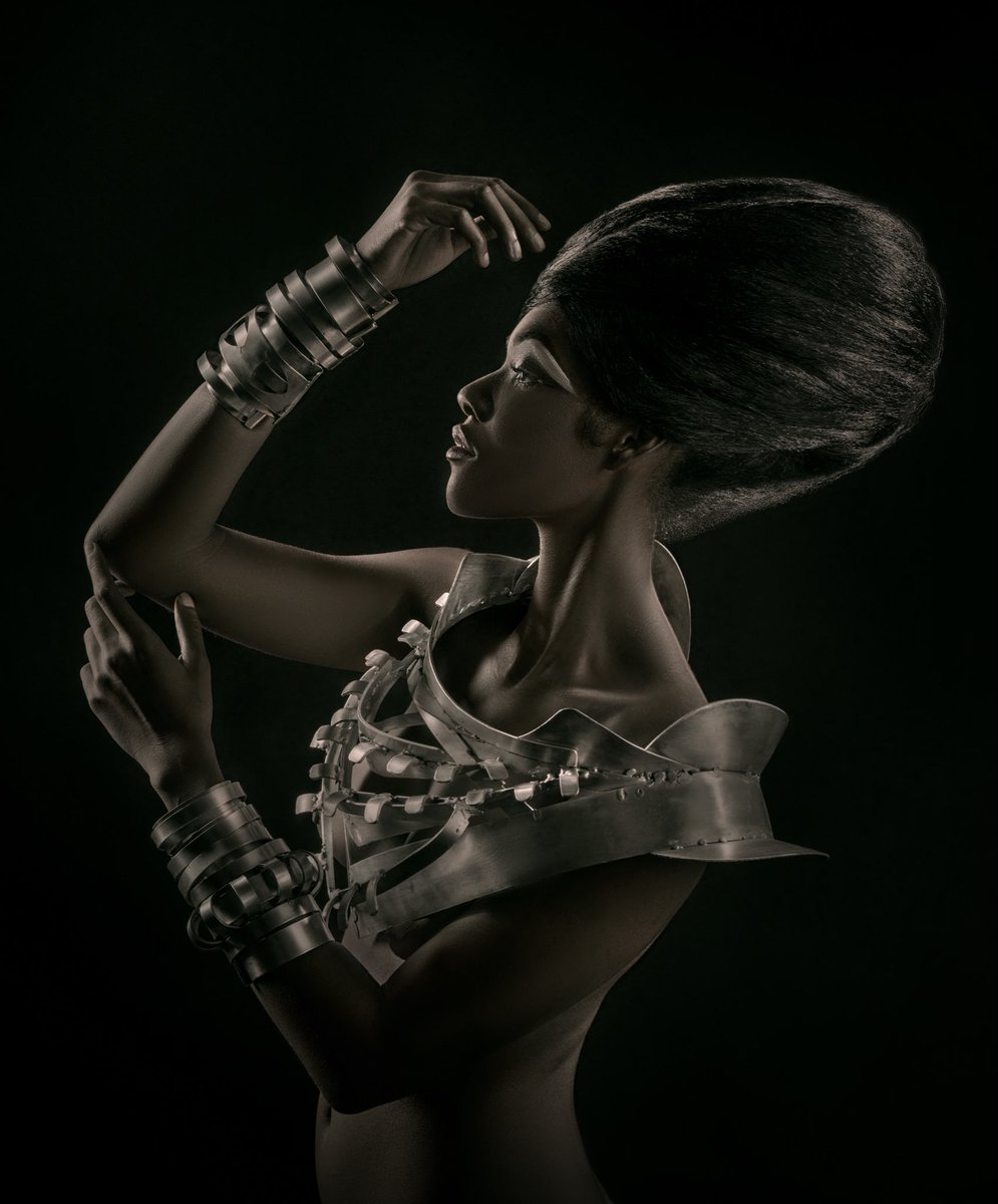 Good morning! 

The future is me - ageless, fearless, calm in a sense of self that I have created, independent of your glare, free from your grip, one that I own intensely, one that sets me free.

Clothed In Metal from the series - ‘I am ageless… she put a spell on Me’ -