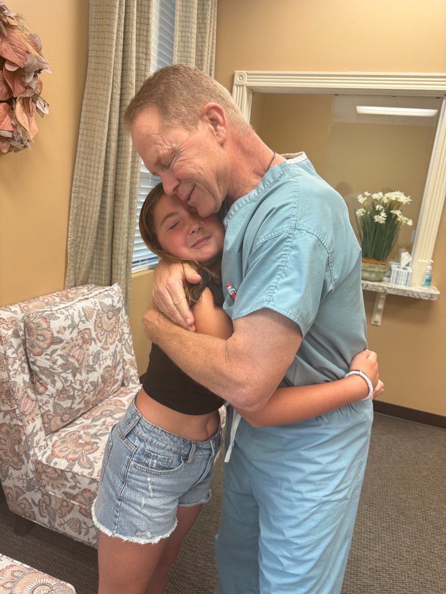 EmbryoDonation's tweet photo. Saylor, a now-10-year-old formerly frozen embryo... embracing the doctor who transferred her out of frozen suspension and into a loving family. If any picture sums up what the NEDC is all about, it's this one. https://t.co/FGSjXAg9xJ https://t.co/ERXJ8avgAJ