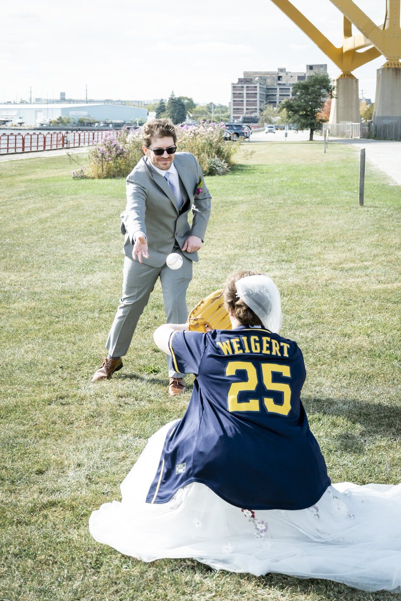 CrazycatSocks's tweet photo. Our wedding this past Sunday. This girl who is a diehard @Brewers fan wanted a baseball picture and we got it. Even in a wedding dress, I was able to get into a catchers position and catch the ball. https://t.co/Lfr8yd1JQA