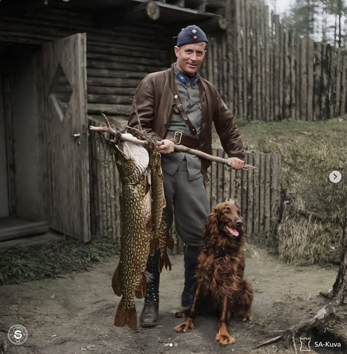 Major Karhunen caught an 11 kg pike. The Irish Setter was the mascot of Fighter Squadron 24. Karhunen was a Finnish fighter pilot, Knight of the Mannerheim Cross, and author. He  achieved 31.5 aerial victories.
At Suulajärvi in Karelia, now russia.

samitoivonpka on Instagram