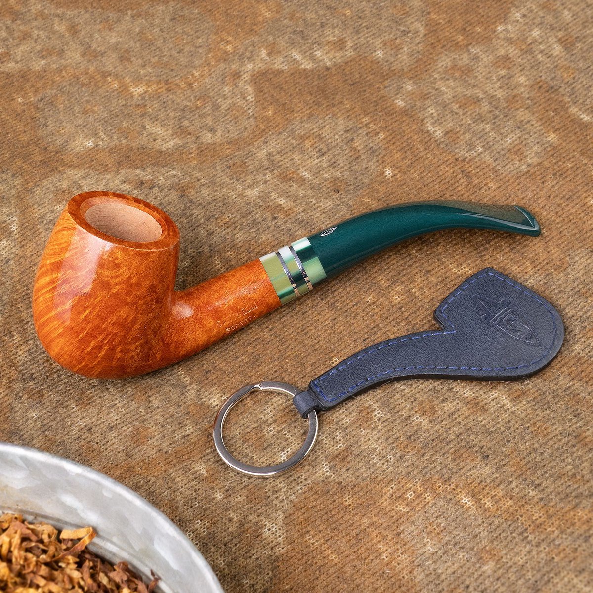 EUSmokingpipes's tweet photo. Accessorize your keys with a subtle keychain, highlighting your passion for pipes. With any purchase of a new Savinelli pipe, receive a complimentary leather keychain, while supplies last. #savinellipipes #pipecollection #pipecommunity #smokingpipes https://t.co/Q0fF17KYdx https://t.co/NNDqAGuuhL