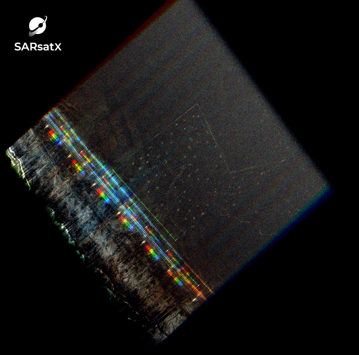 SARsat_X's tweet image. Our airborne X-band synthetic aperture radar, SSX-1 (SARsatX-1), produced the following media during its first-light campaign. The scene includes sand dunes in the near range, a desert campsite in the far range, and pylons with power lines running alongside a highway bordered by…