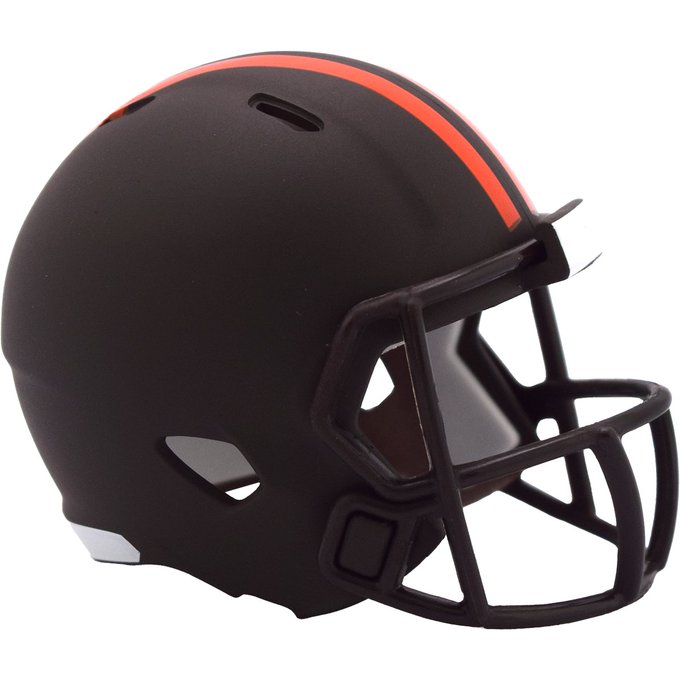Black football helmet with orange stripe running from front to back, featuring multiple ventilation holes on sides and top, clear faceguard with metal bars, and Riddell branding visible on the side. Second image shows similar angled view highlighting the orange stripe and matte black finish with faceguard details.