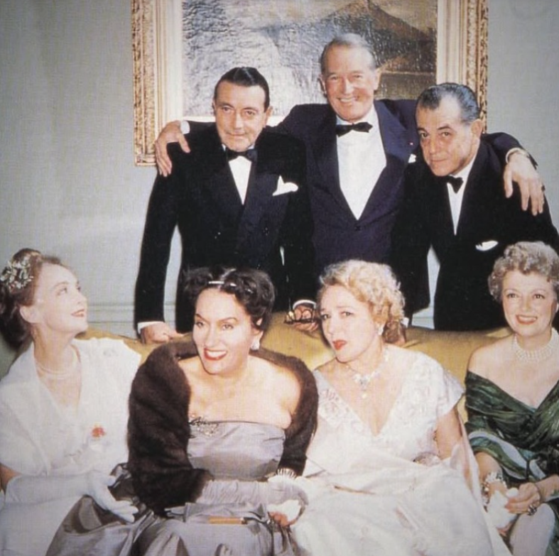 Silent screen legends Richard Barthelmess, Maurice Chevalier, Ramon Novarro, Lillian Gish, Gloria Swanson, Mary Pickford, and Janet Gaynor at the 1955 George Eastman Award Dinner photographed by fellow silent film legend Harold Lloyd.