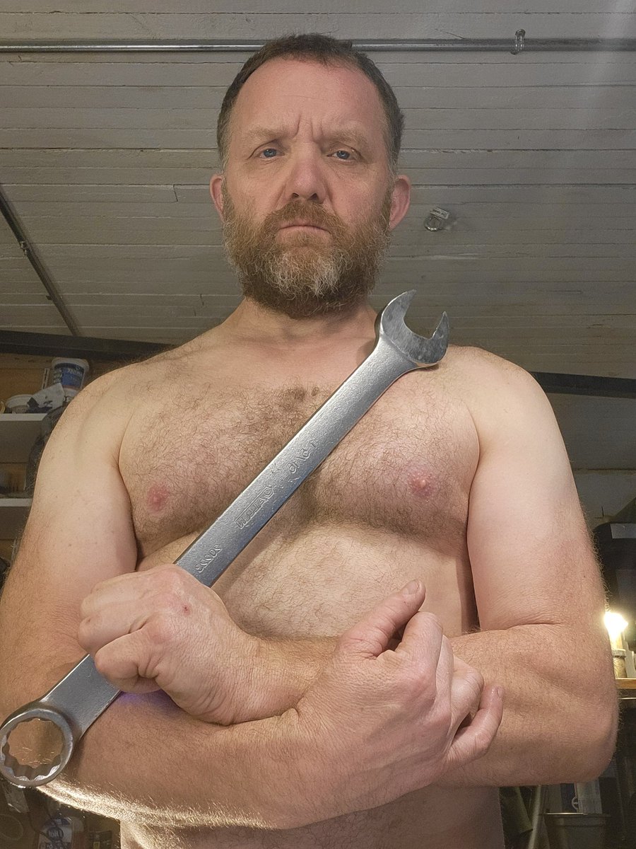 SeattleManwhore's tweet photo. This wrench is very serious.   That's why I look so stern. https://t.co/nnpwu9d4Nq