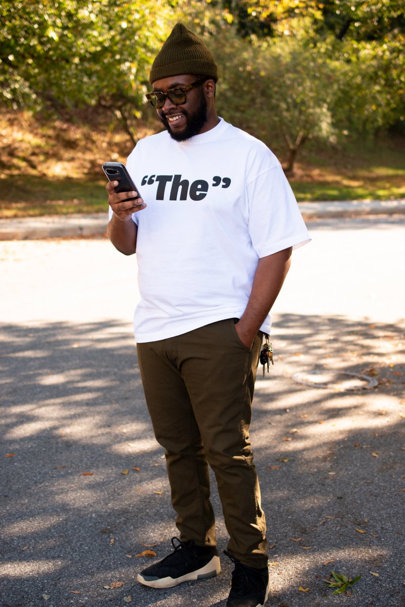 No jacket just "The"

- Filson Cap
- In Search Of By Davon Ford
 a. Second Impact "Tokyo-3"
 b. "The" Tee Shirt
- Railcar Fine Goods Trousers
- Nike Air Fear of God