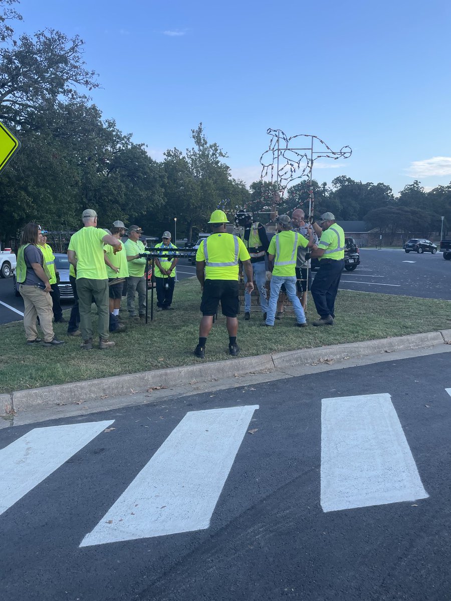 Fort Smith Parks and Recreation employees work on another holiday light installation at Creekmore Park this week.