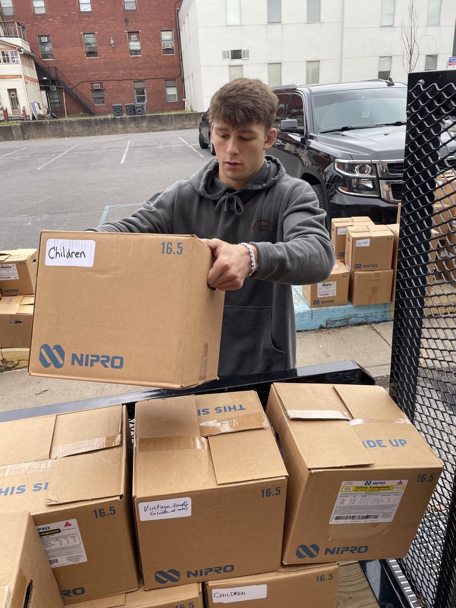 lycowrestlers's tweet photo. The Warriors once again helped out yesterday moving books for the James V Brown Library’s book sale #TeamLyco https://t.co/avHgKG7yOE