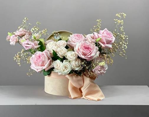 let’s stop wasting time talking byabout me. Let’s talk about you..I got something for you.

Jonathan walks to the ropes. The timekeeper hands him a flower bouquet. The crowd murmurs in confusion. Jonathan sets the bouquet on the table between Alan and Adam. Alan leans closer with