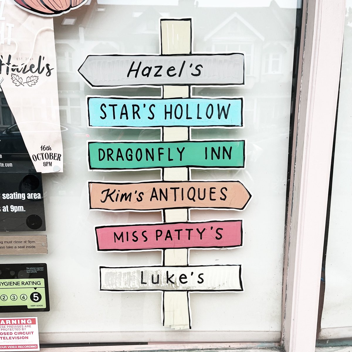 allniqht's tweet photo. absolutely obsessed with this cafe just down the road from my dorm that has a gilmore girls mural https://t.co/VvwH7bCcU0