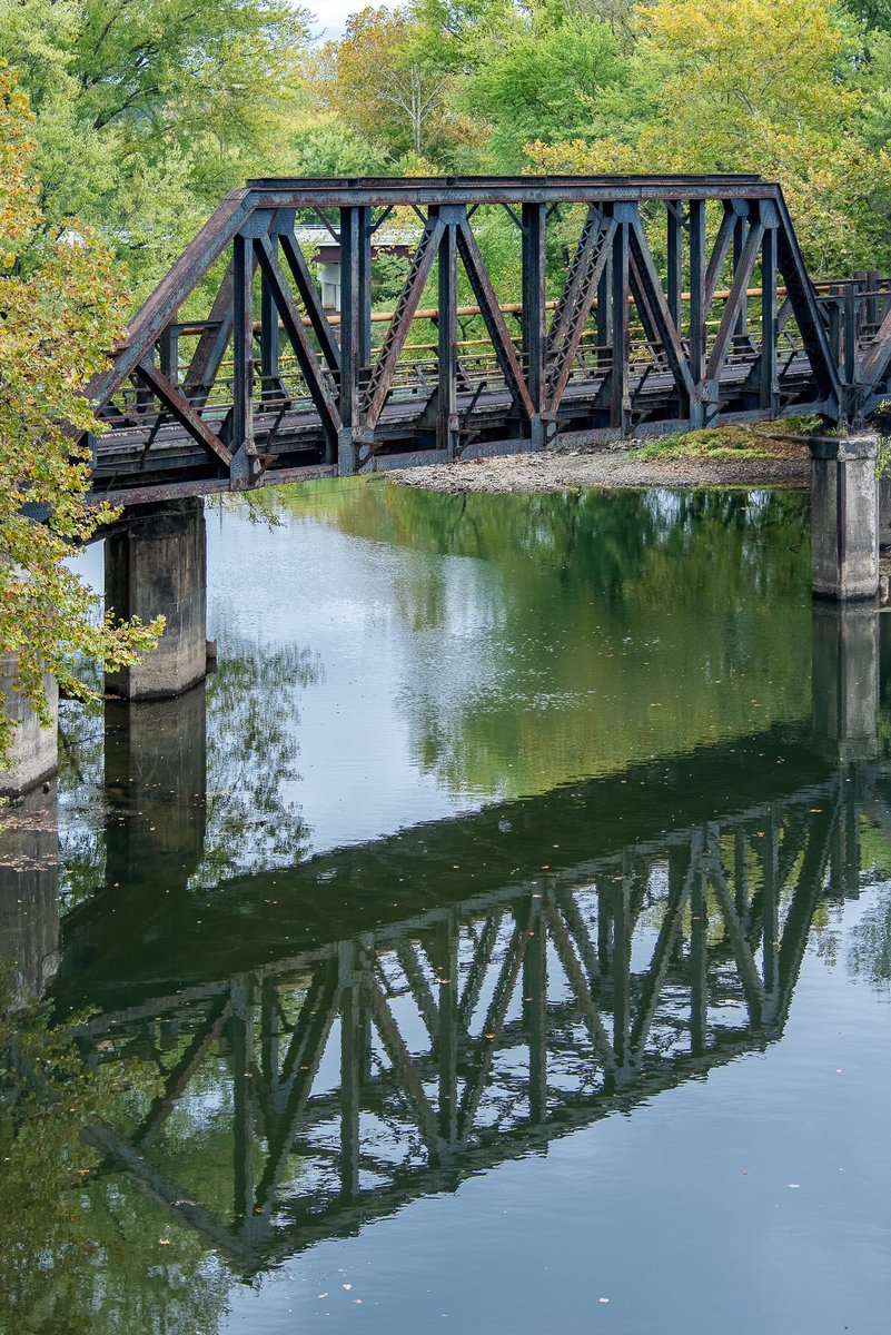 Reflection upon autumn; an old steel span across the Mahoning River near Youngstown, Ohio.