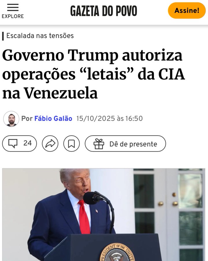 Screenshot of a news article webpage from Gazeta do Povo titled Escalada nas tensões Trump autoriza operações letais da CIA na Venezuela dated 15/10/2025 at 16:50 by Fabio Gallo with 24 comments and a present icon. Below the article preview an image shows Donald Trump standing at a wooden podium speaking into microphones wearing a blue suit white shirt red tie and American flag pin with the blue presidential seal backdrop behind him.
