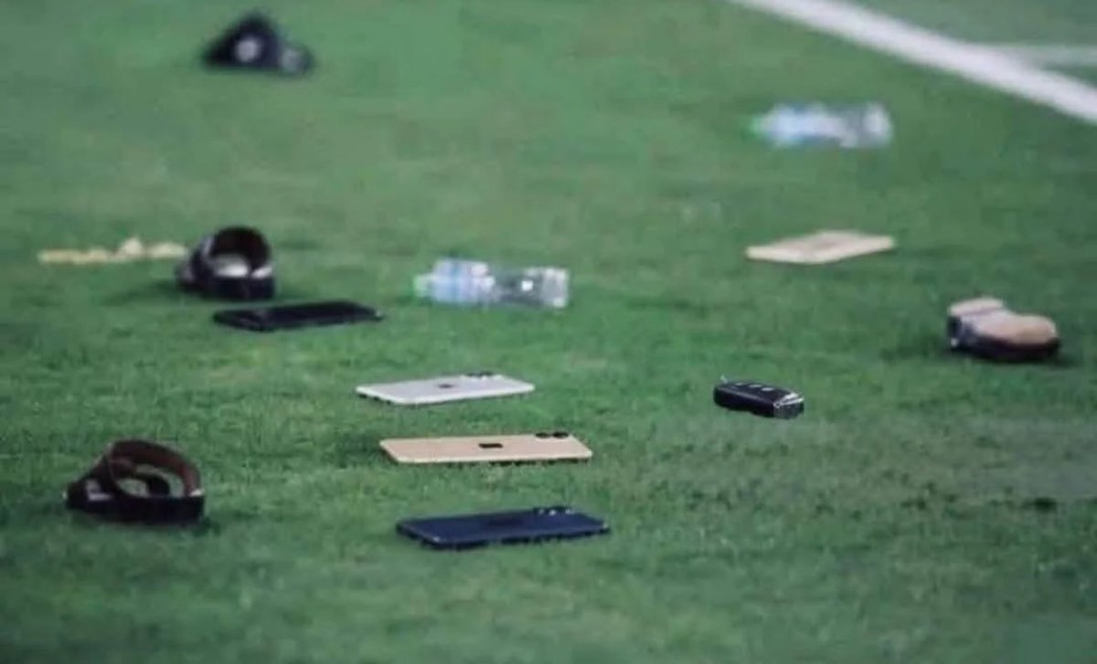 The UAE hooligans threw IPhones and car keys instead of water bottles and lighters.