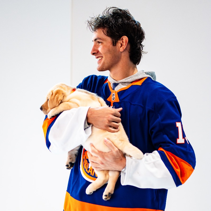 NYIslanders's tweet photo. Behind the scenes at the Pucks &amp; Paws Calendar photoshoot presented by PetMeds!